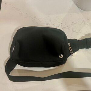 Lightly used Lululemon black belt bag